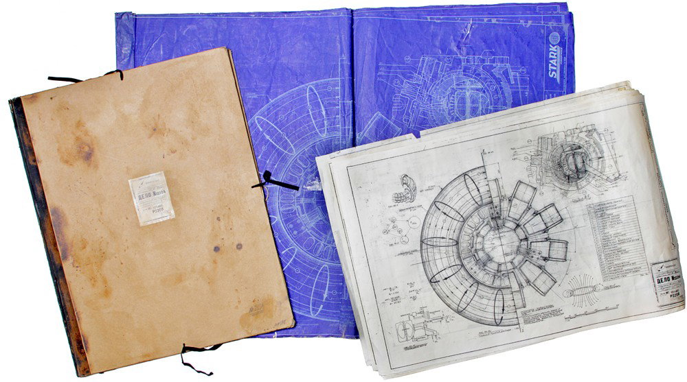 Iron Man 2 Ivan Vanko's Hero Arc Blueprints: Production Description: Set of hero blueprints used by Ivan in the opening scene of the movie. He can be seen unfolding these prints and following there direction in building his arc reactor. Producti