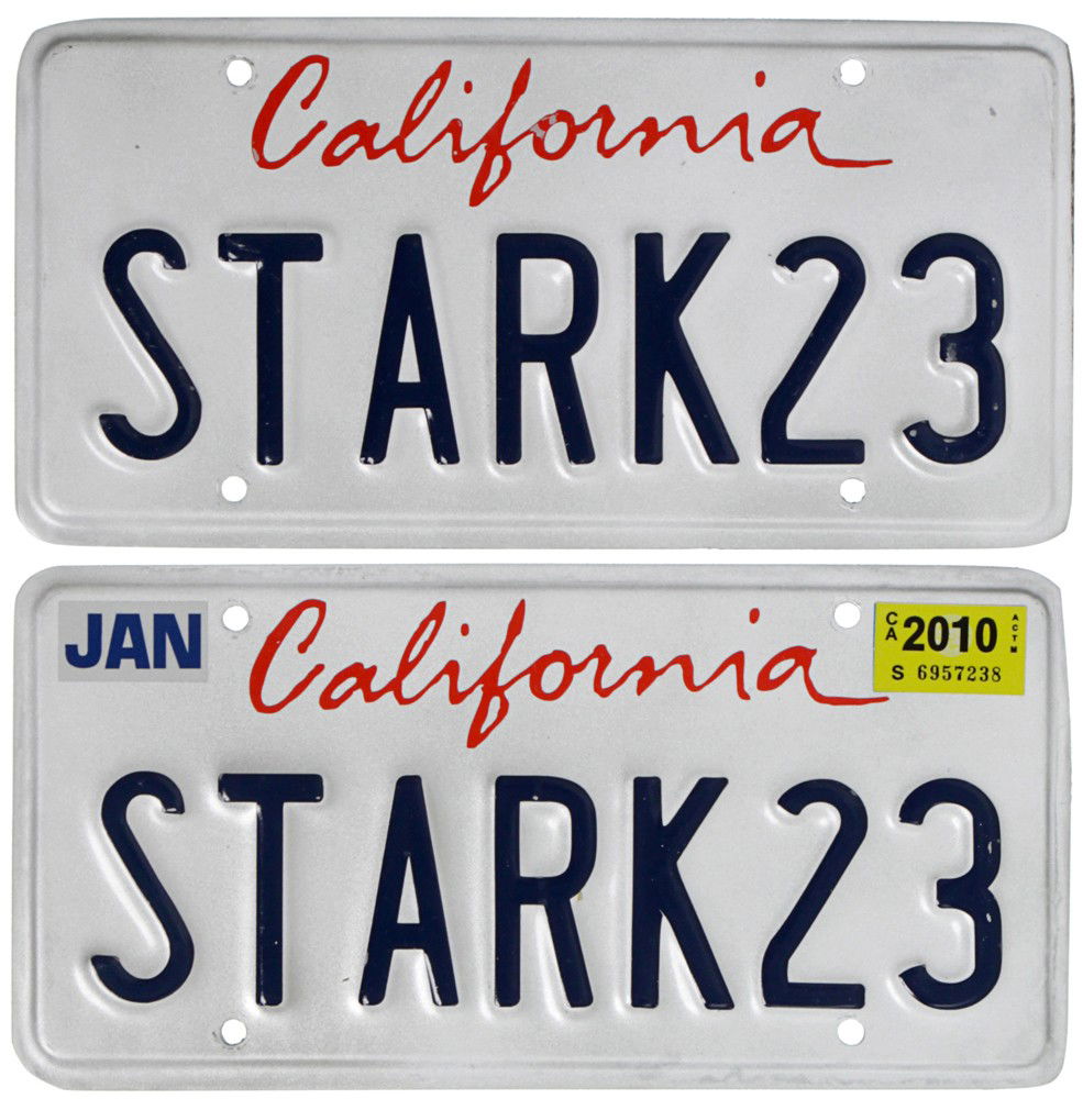 Iron Man 2 "Stark 23" License Plate Set: Production Description: Set of two vanity license plates with the name "Stark 23" on them. These plates were used on one of Tony's various luxury cars, as he had different numbers for each of them. P