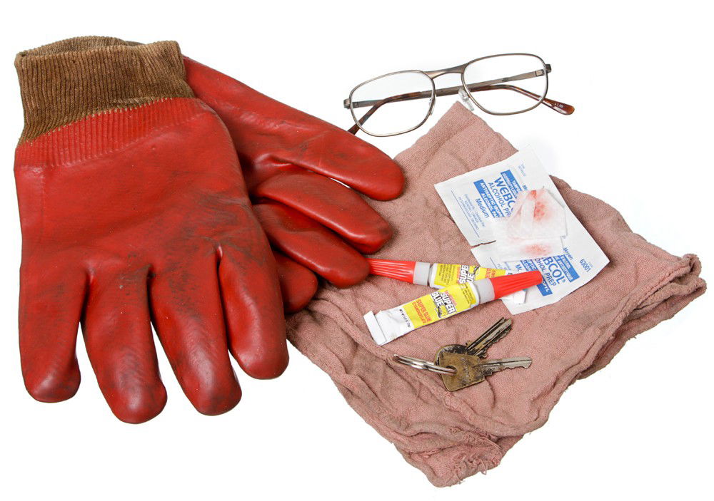 The Incredible Hulk Bruce Banners Personal Set: Production Description: The glasses, work gloves and other belongings used by Bruce Banner while working at the bottling plant in Brazil. Included are the superglue tube used to seal the cut on his h