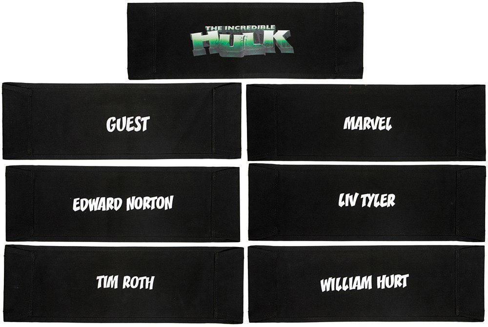 The Incredible Hulk Set of Director Chair Backs: Production Description: Set of six black directors chair backs. All feature the INCREDIBLE HULK logo silkscreened on the back side. Set includes the chair backs for Edward Norton, Liv Tyler, Tim Roth,