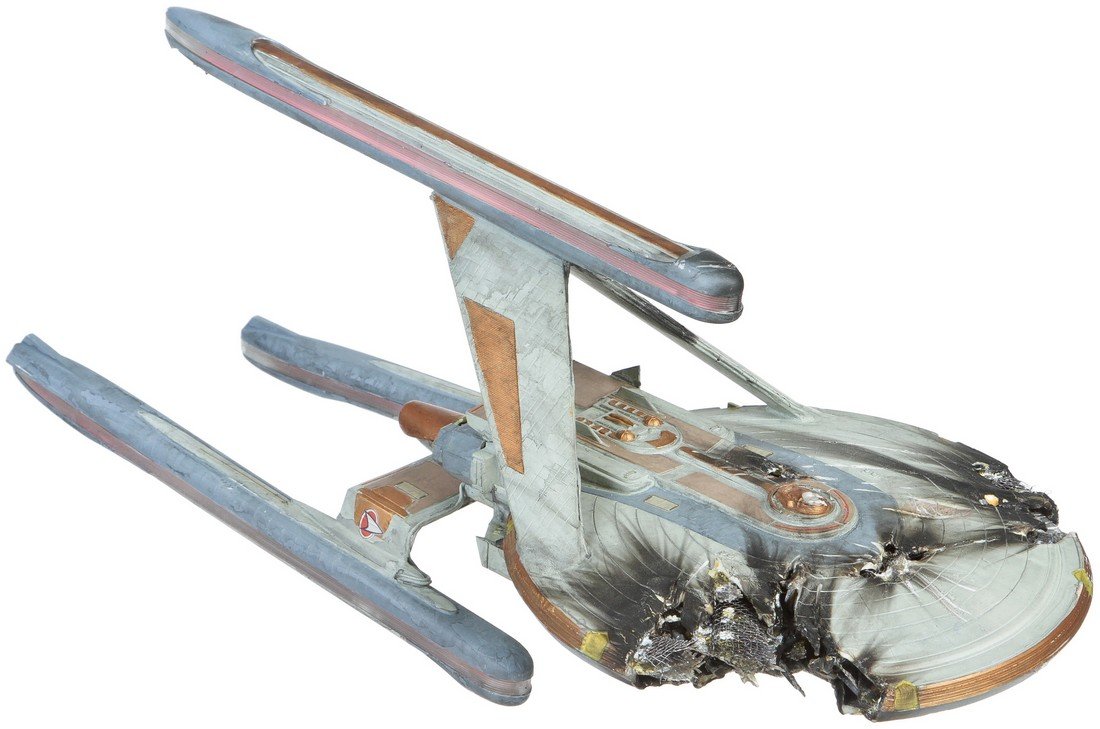 Star Trek: Deep Space Nine "USS Hutzel" SFX Miniature: A miniature filming model of the "U.S.S. Hutzel" featured in Star Trek: Deep Space Nine. This starship is a Excelsior class variant used as a member of the "Frankenstein Fleet", a fleet of models made