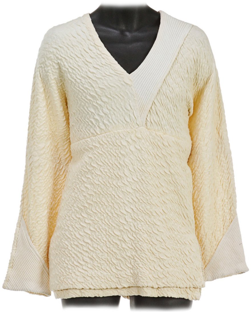 Star Trek: The Next Generation Geordi La Forge Tai Chi: This is a Tai Chi top worn by Geordi La Forge (LeVar Burton) in the season four episode "Clues" of Star Trek: The Next Generation. This costume features a cream puckered fabric with white accents on t