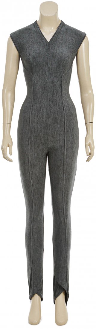 Star Trek: Enterprise T'Pol "Night in Sickbay" Uniform: A blue full-length uniform worn by T'Pol (Jolene Blalock) in the Star Trek: Enterprise season two episode "A Night in Sickbay". After Porthos picks up a deadly alien virus, Captain Archer stays with h