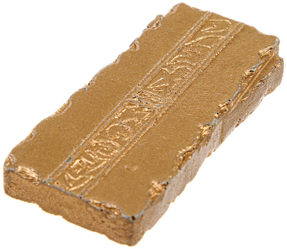 Star Trek: Deep Space Nine Latinum Strip: A piece of gold pressed Latinum featured in the production of Star Trek: Deep Space Nine. Latinum is a rare silver-colored liquid used as currency by the Ferengi Alliance and many other worlds. It can