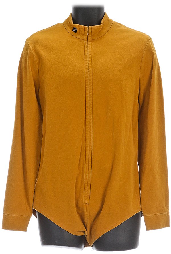 Star Trek: Deep Space Nine Chief O' Brien Undershirt: A gold operations undershirt for wear by Chief O' Brien (Colm Meaney) in Star Trek: Deep Space Nine. This standard issue undershirt can be seen worn under his dress gray uniform, features a sewn in "e