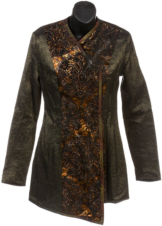 Star Trek: Deep Space Nine Jennifer Sisko Hero Jacket: Hero Jacket worn by Jennifer Sisko, actress (Felicia Bell) in the Star Trek: Deep Space Nine episode "Shattered Mirror". The jacket is olive in color with darker green accent lines running down the sl