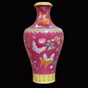 An Exquisite Famille-RoseAn Exquisite Ruby Red Glazed Flower and Butterfly Pattern Vase