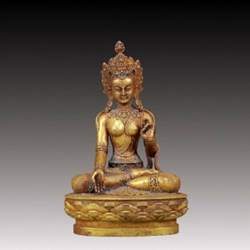 A Solemn Gilt Bronze Statue of White Tara