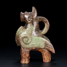 An Exquisite Archaic Jade Dog Ornament