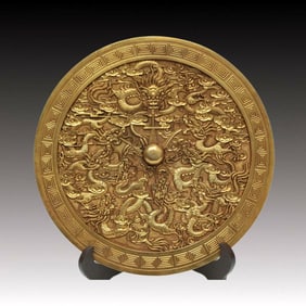 A Brilliant Circular Gilt-Bronze 'Dragon& Auspicious Cloud' Mirror