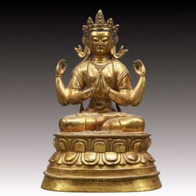 A Solemn Gilt Bronze Statue of Four-Armed Guanyin