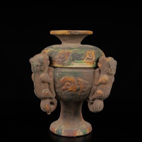 An Exquisite Tang Tri-Color Glazed Pottery Auspicious Beast lidded jar