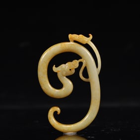 An Archaic Hongshan Culture White Jade Dragon Pendant