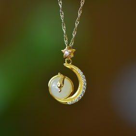An Exquisite Sterling Silver-Gold Plated Inlaid White Jade Pendant