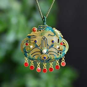 An Exquisite Sterling Silver-Gold Plated Inlaid White Jade Pendant