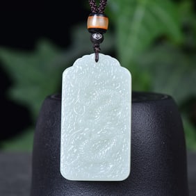 An Exquisite White Jade Dragon Pattern Pendant