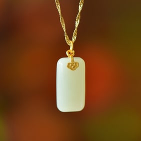 An Exquisite Sterling Silver-Gold Plated Inlaid White Jade Pendant