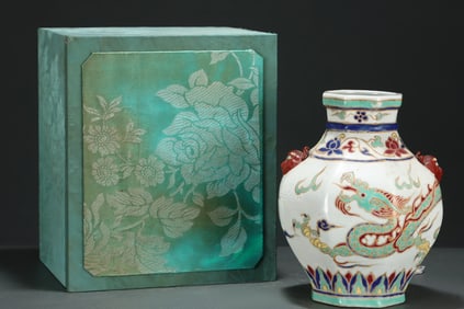 An Exquisite Wucai Auspicious Cloud and Dragon Pattern Beast-Ears Jar