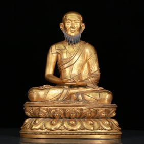 An Elaborate Gilt-Bronze Figure Of Mahasiddha