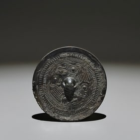 An Archaic Bronze Auspicious Beast Pattern Round Mirror