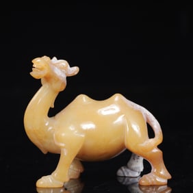 An Exquisite Yellow Jade Auspicious Beast Pendant