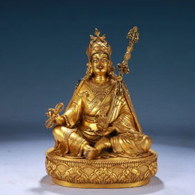 A Solemn Gilt Bronze Statue of Padma Sambhava