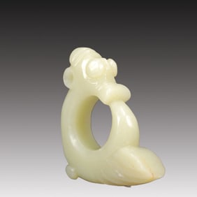 A Rare White Jade Auspicious Beast Pendant
