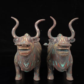 A Pair of Archaic Bronze Inlaid Gold and Silver Buffalo Ornaments,Inlaid Gems