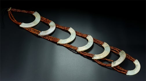 An Exquisite White Jade Pendant