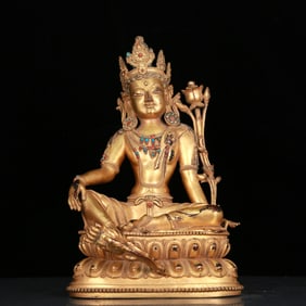 An Elaborate Gilt-Bronze Gem-Inlaid Figure Of Green Tara