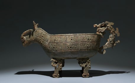 An Archaic Bronze Chi-Dragon Pattern Beast-head Four Legs Cup