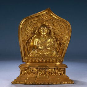 A Solemn Gilt Bronze Statue of Guru