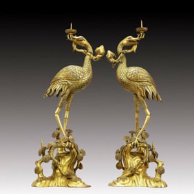 A Pair of Rare Gilt Bronze Crane Candlesticks