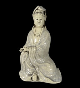 A Solemn Blance-De-Chine Statue of Avalokitesvara