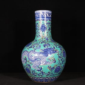 A Rare Green Ground Blue and White Lotus and Dragon Pattern Vase