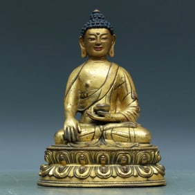 An Archaic Gilt-Bronze Figure Of Buddha Shakyamuni