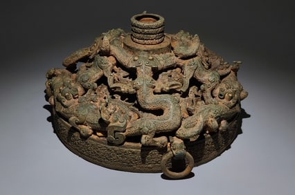 An Archaic Bronze Hollow  Dragon Pattern Ornament