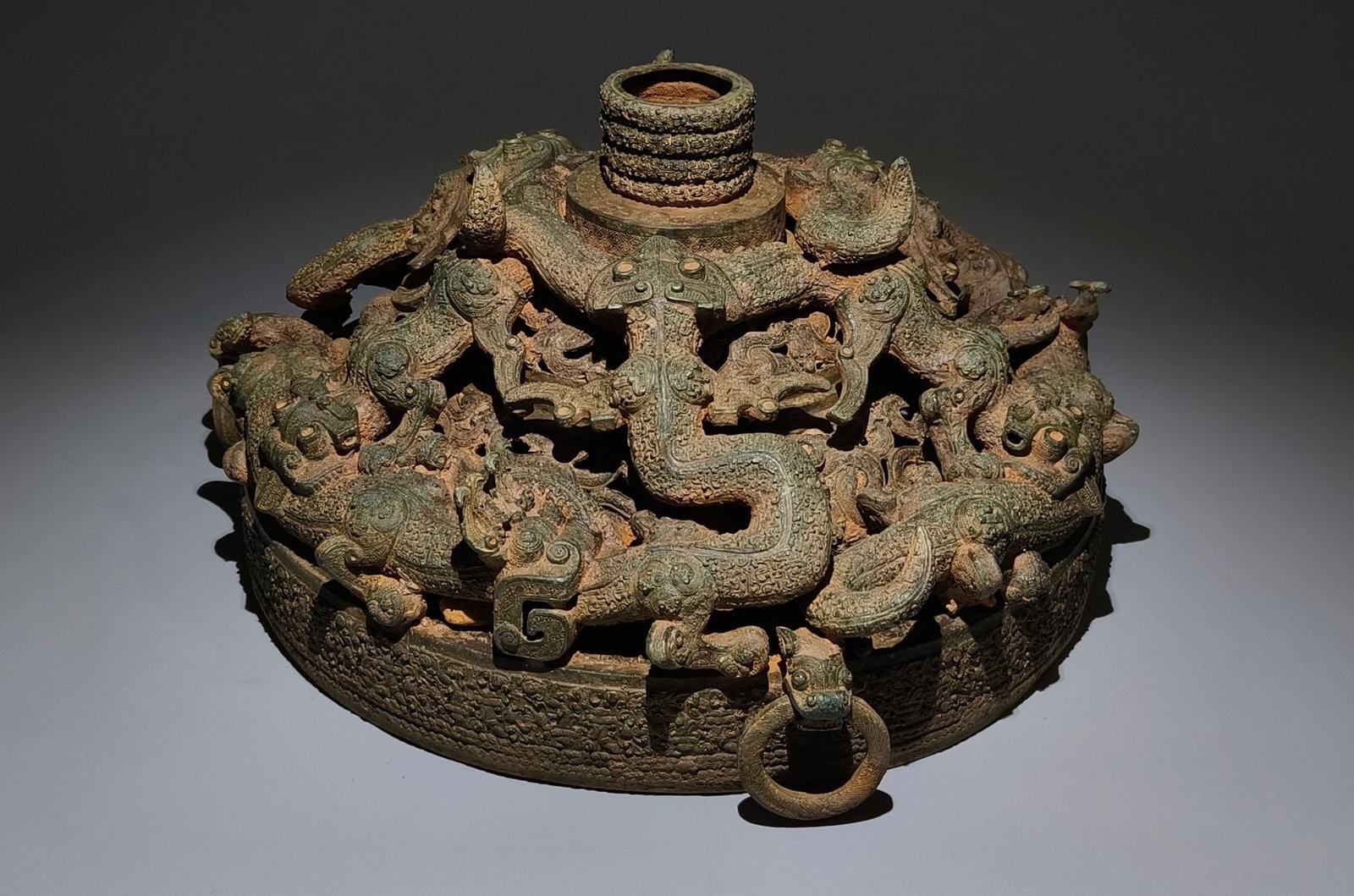 An Archaic Bronze Hollow  Dragon Pattern Ornament (1 of 15)