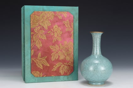 An Exquisite Ru yao Sky Blue Glazed Cover with Gold Vase