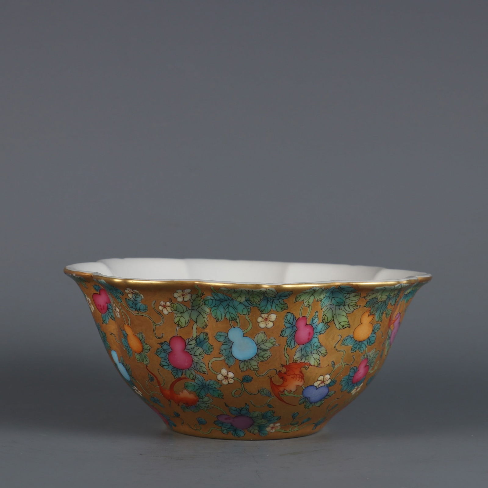 An Exquisite Gold Ground Famille-Rose Bats,Gourd and Flower Pattern Bowl (1 of 9)