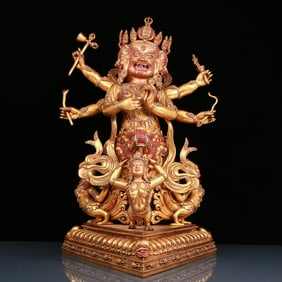 A solemn gilt bronze Vajra statue