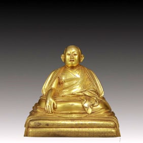 A Solemn Gilt Bronze Statue of Guru