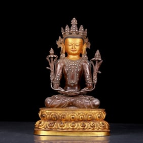 An exquisite gilt bronze and silver statue of Tara