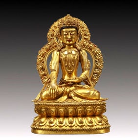 A Solemn Gilt Bronze Statue of Sakyamuni
