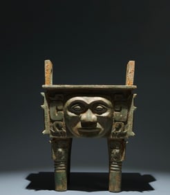 An Archaic Bronze Human-face Pattern Double-Ears Four Legs Food Vessel