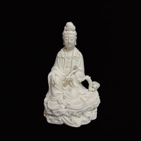 A Solemn Blance-De-Chine Statue of Avalokitesvara