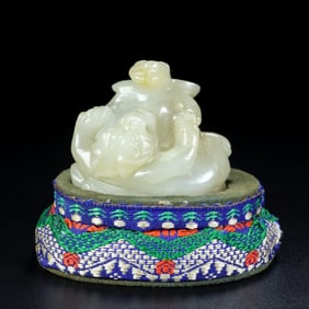 An Exquisite White Jade Auspicious Beast Ornament