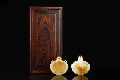A Pair of Exquisite White Jade Snuff Bottles