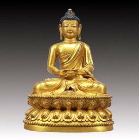 A Solemn Gilt Bronze Statue of Sakyamuni