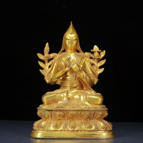 A Solemn Gilt Bronze Statue of Guru